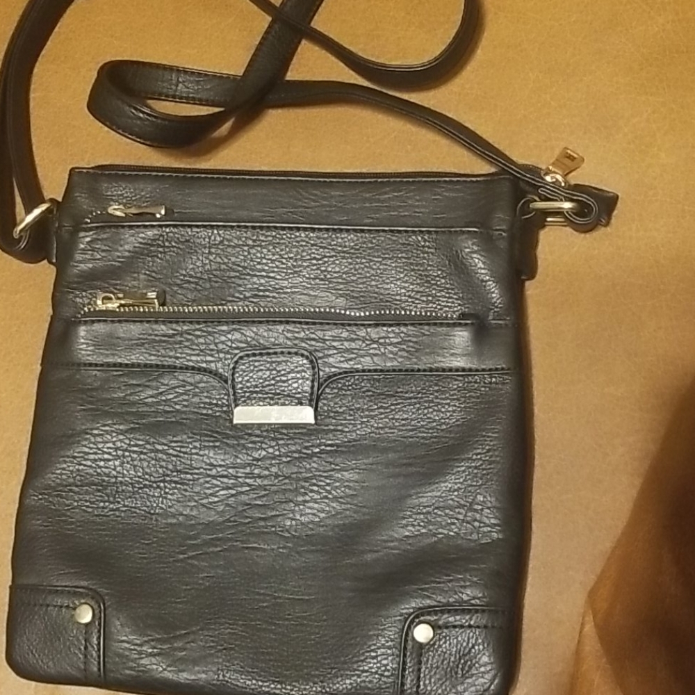 New Crossbody bag, without tag. Size approximate